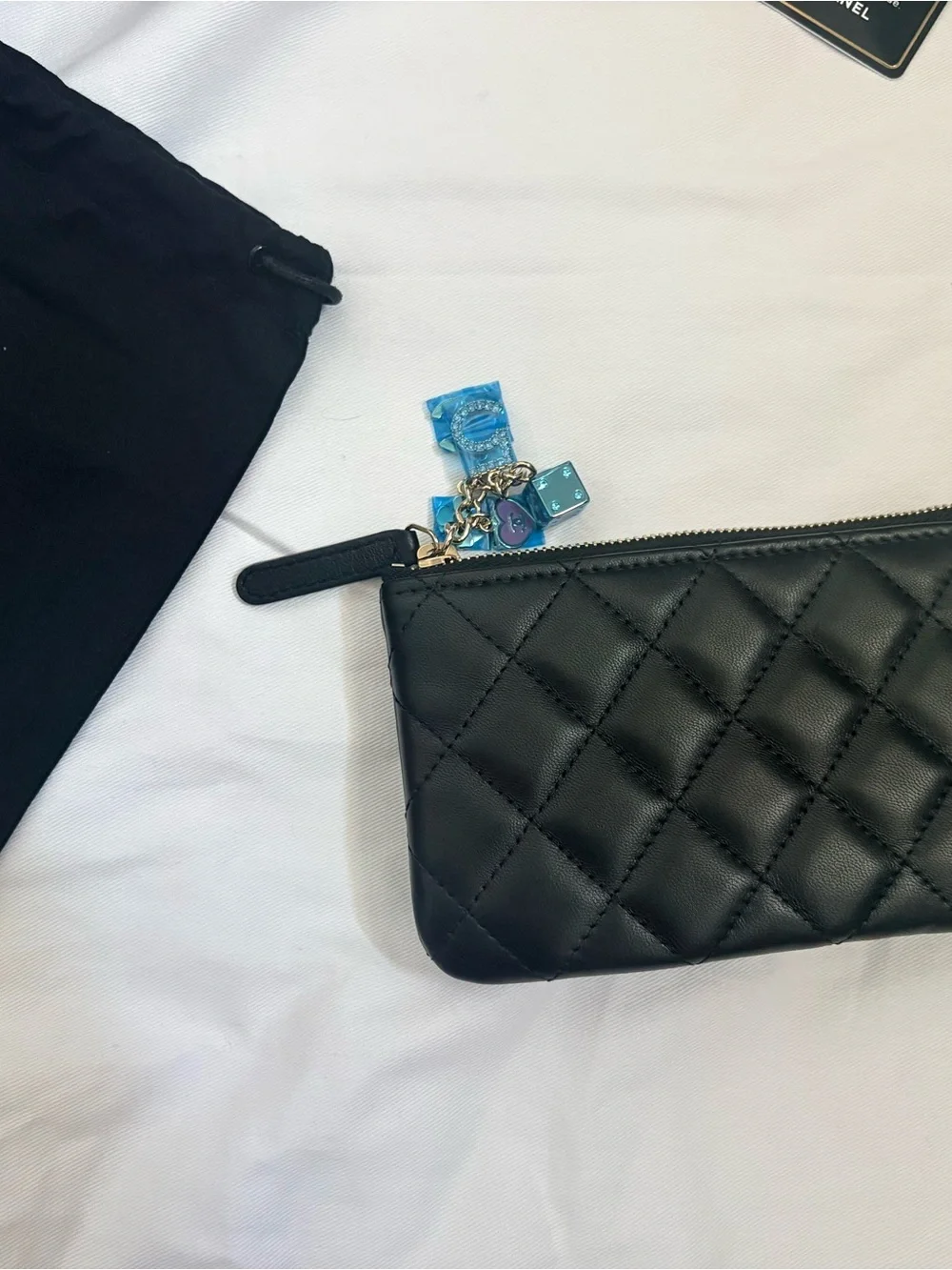 COA CHANEL Black Quilted Leather mini O charms pouch